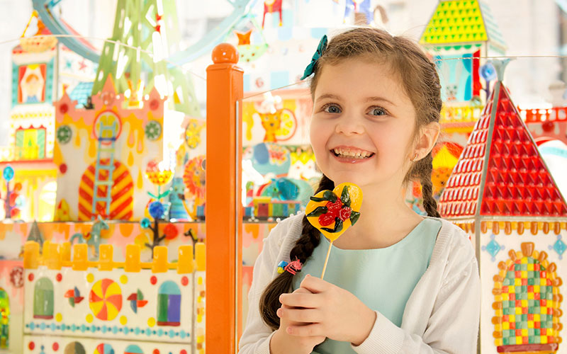 One of the Sweets' great-grandchildren in the candy shop.